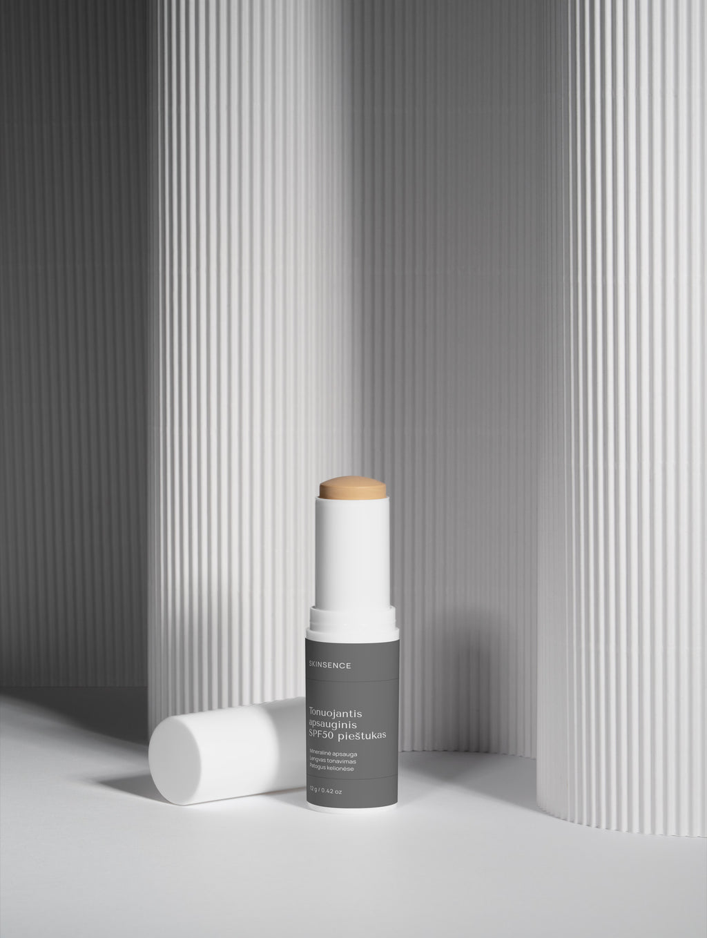 Tonuojantis apsauginis SPF50 pieštukas